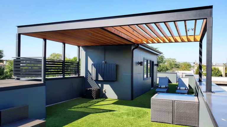 beautiful outdoor relaxation oasis on the rooftop done by pergola builder