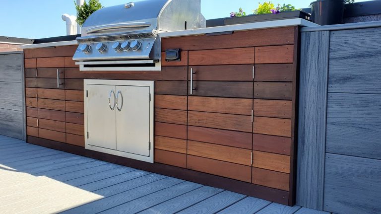 close up to outdoor wooden kitchen on the roof deck